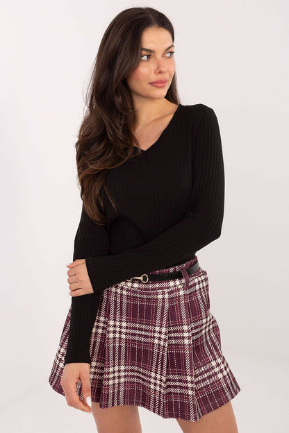 Draped view of the Rue Paris V-neck blouse in stylish office attire, ideal for versatile day-to-night looks.