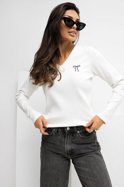 Chic women's blouse by Rue Paris made from soft cotton blend fabric, exhibiting a modern and elegant silhouette with a flattering V-neck.