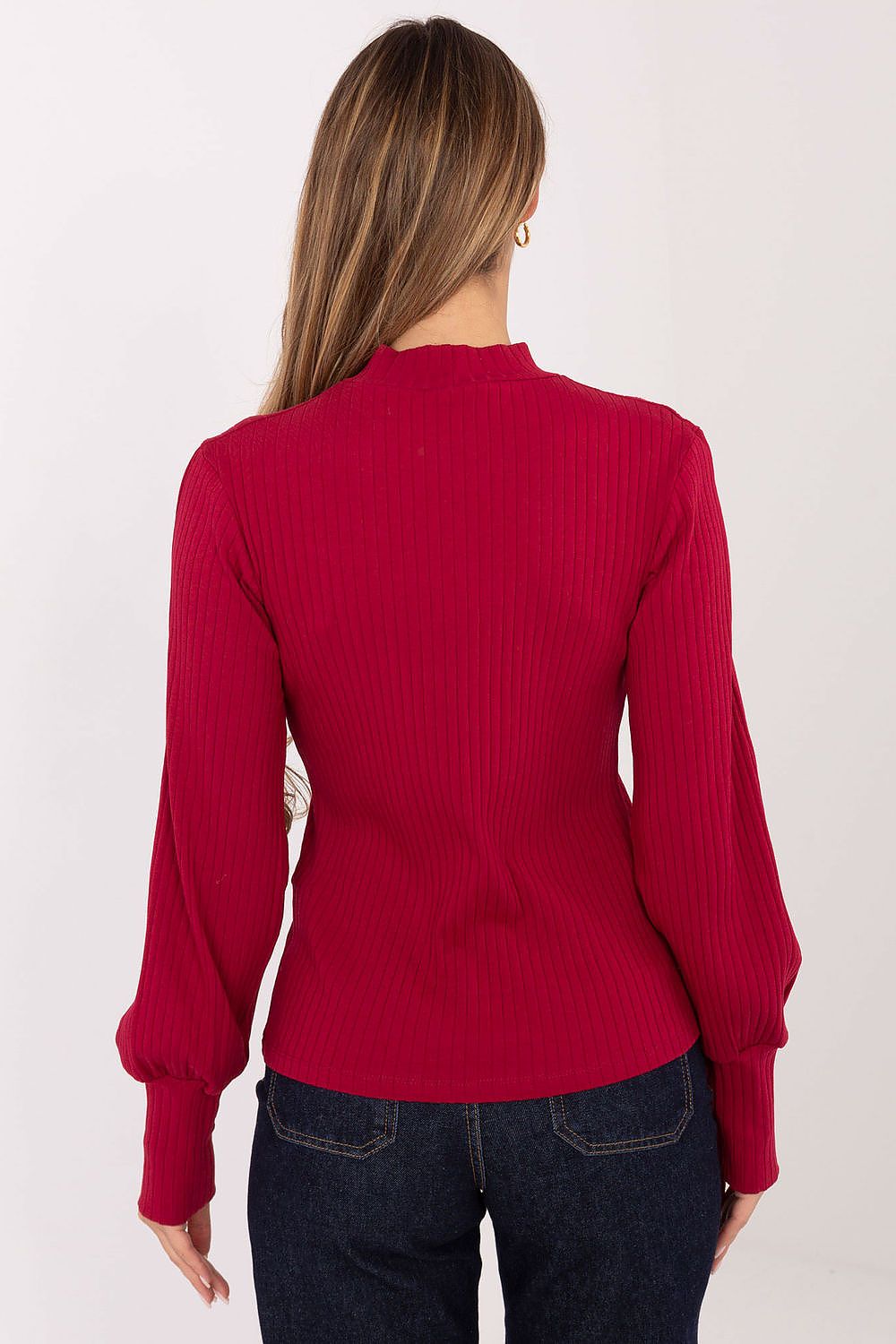 Close-up of Rue Paris blouse highlighting the soft cotton-elastane fabric, elegantly designed with trendy puff sleeves and a chic turtleneck.