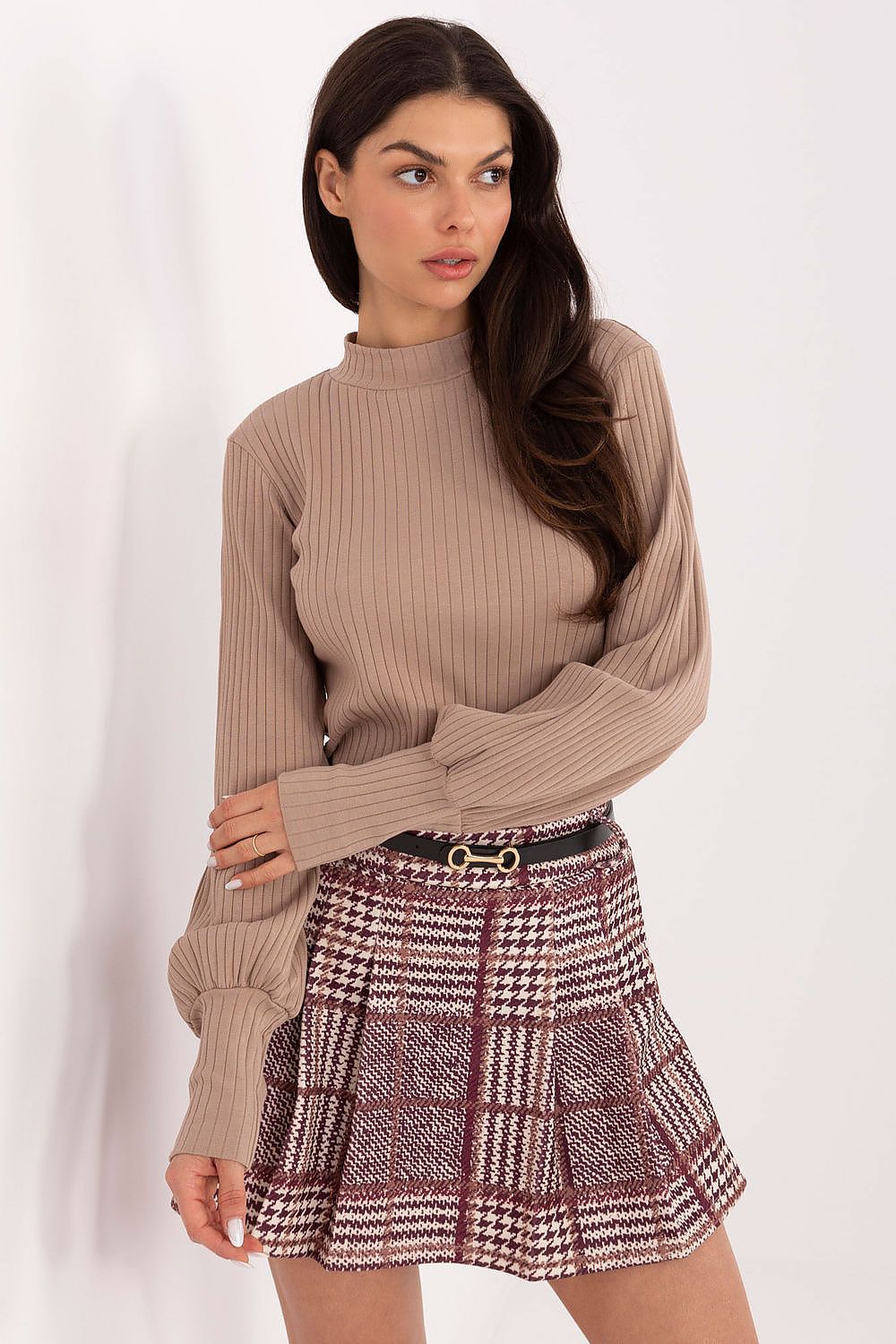 Detailed view of Rue Paris blouse's puffy sleeve and cuff, embodying luxury and comfort in everyday fashion.