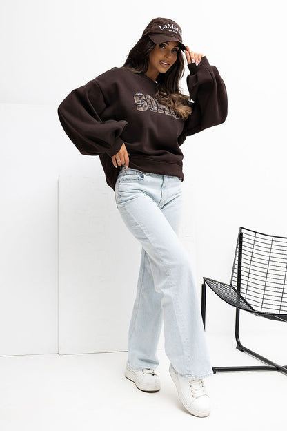 Elegant women's cotton blend sweatshirt by Rue Paris featuring a unique vertical back cut, perfect for stylish everyday wear.