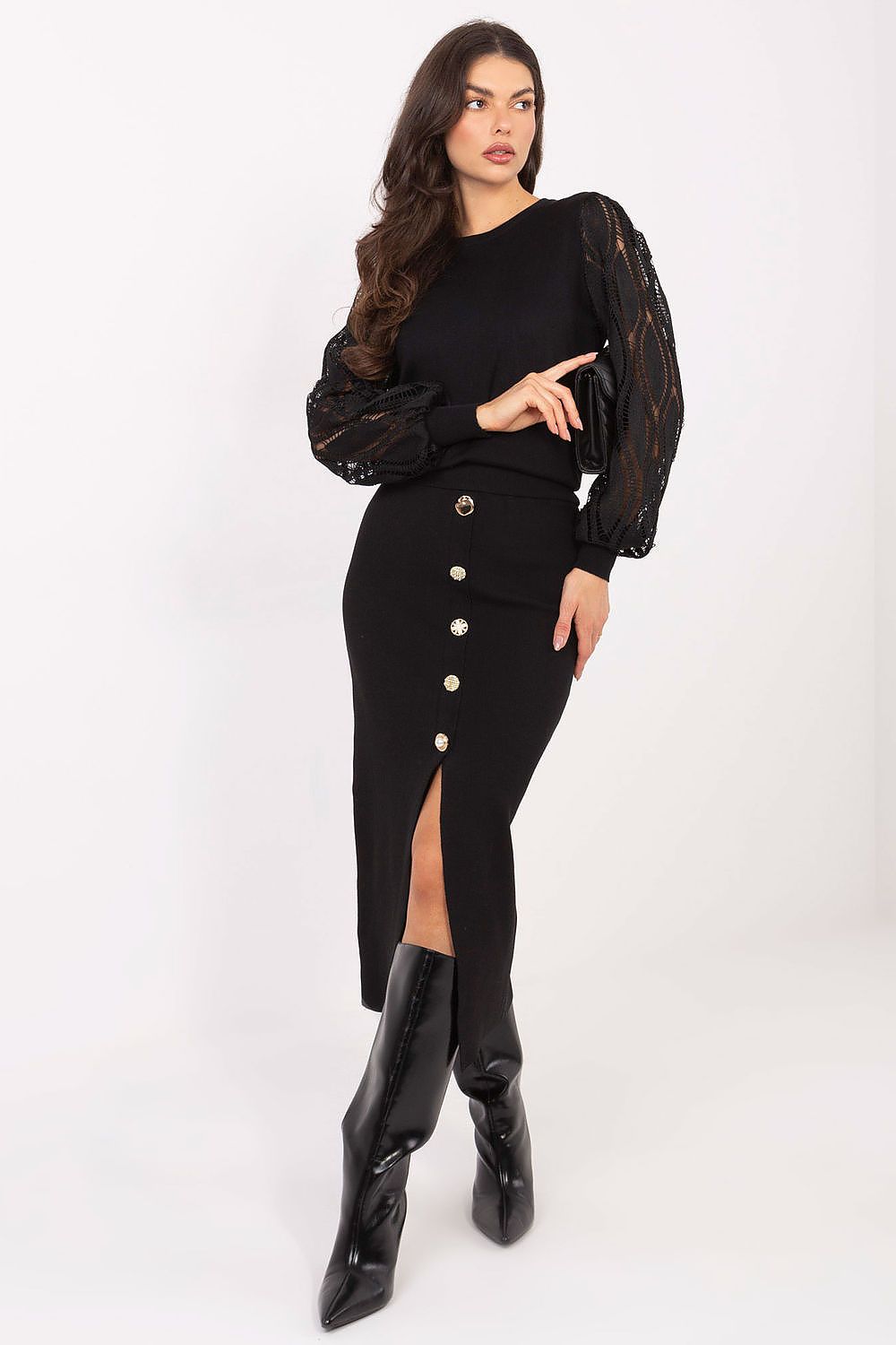 Elegant midi-length knitted skirt with decorative buttons and front slit, comfortable fit, perfect for formal and everyday styling by Factory Price.