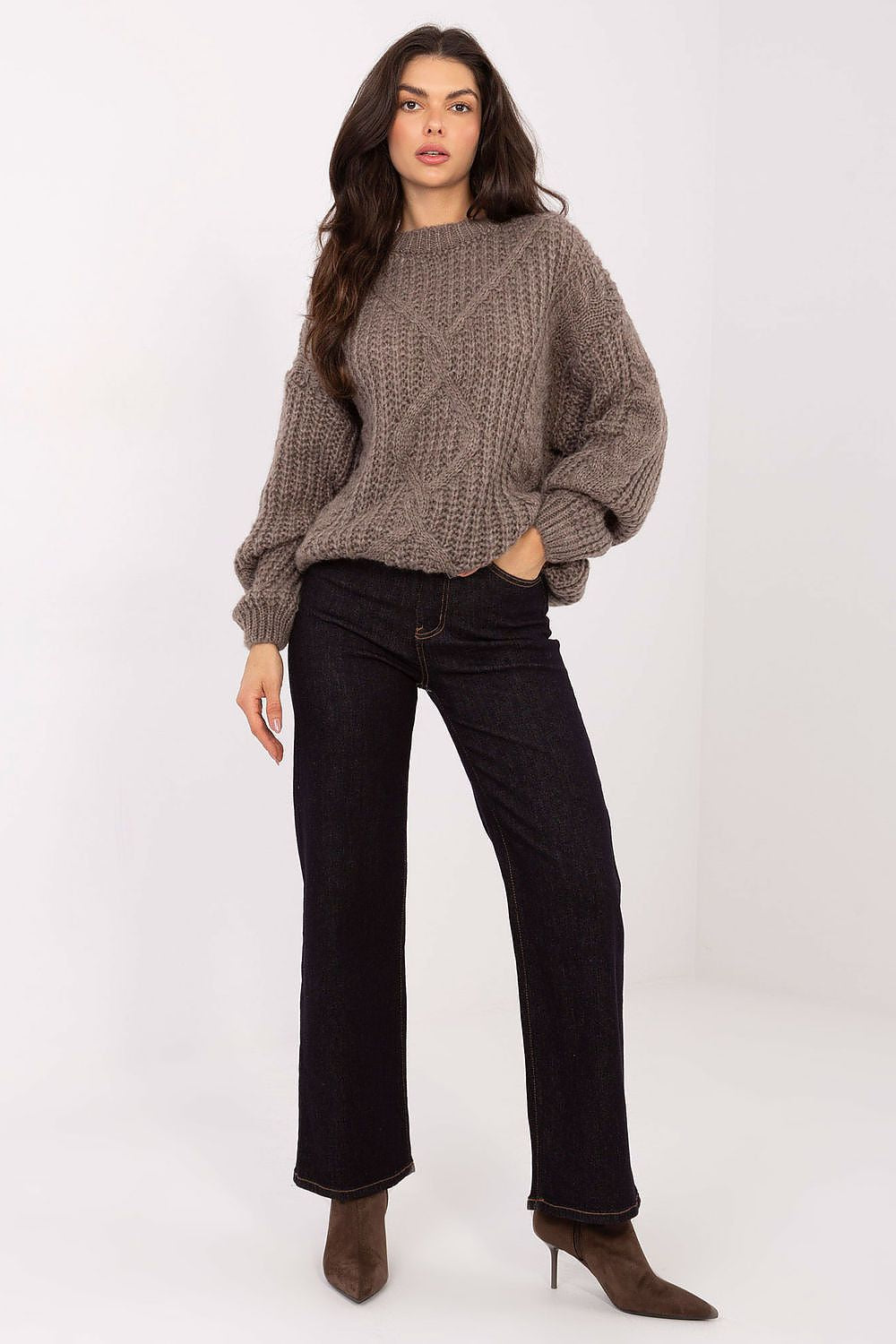 Model wearing the Factory Price Luxury Soft Women's Sweater, perfectly styled for casual outings with jeans.