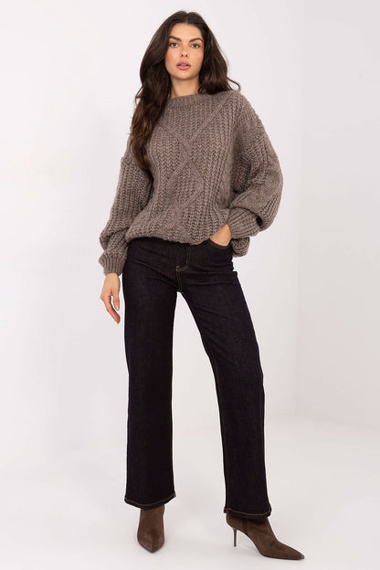 Model wearing the Factory Price Luxury Soft Women's Sweater, perfectly styled for casual outings with jeans.