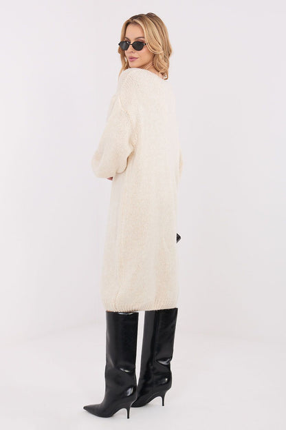 Factory Price Oversized Knit Midi Sweater Dress, highlighting its feminine V-neck design and comfortable long sleeves, perfect for sophisticated casual outings.