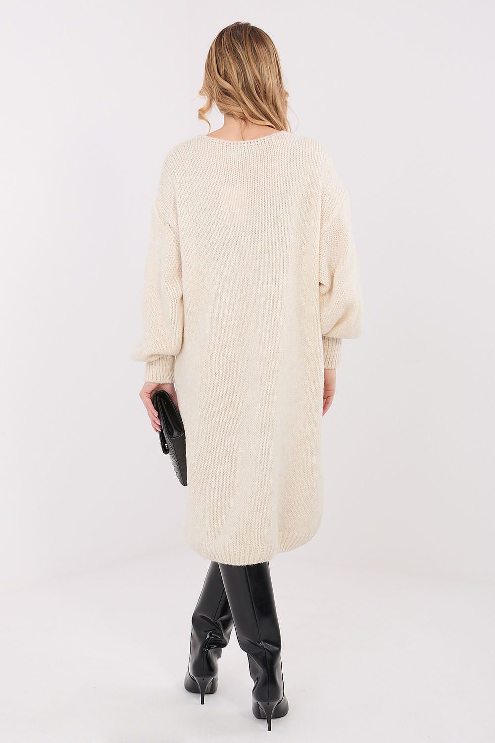 Close-up of the luxurious knit texture of the Oversized Midi Sweater Dress by Factory Price, embodying comfort and timeless style for modern elegance.