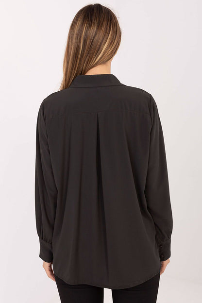 Puff sleeve design of the elegant women's shirt by Factory Price, highlighting the chic and fashionable character of the garment.