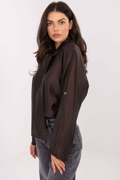 Stylish long sleeve blouse featuring a feminine tie neckline design, made from luxurious Tencel and polyester material, available from Factory Price for the fashion-forward woman.