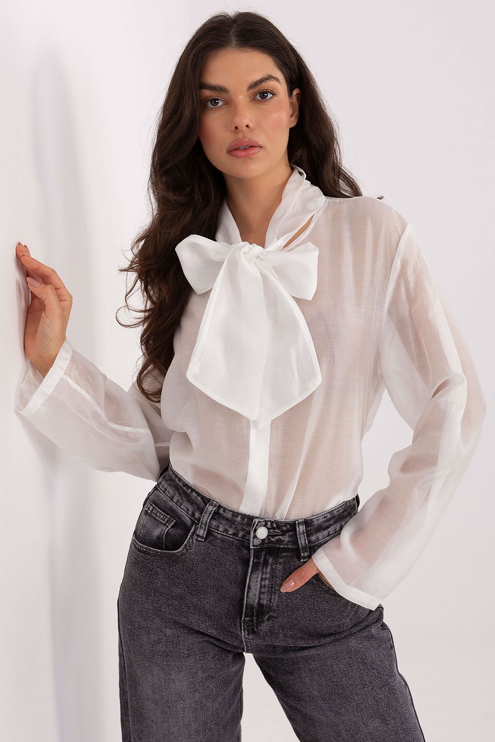 Close-up view of the tie neckline detail on an elegant women's long sleeve shirt by Factory Price, crafted from luxurious Tencel-polyester blend fabric.