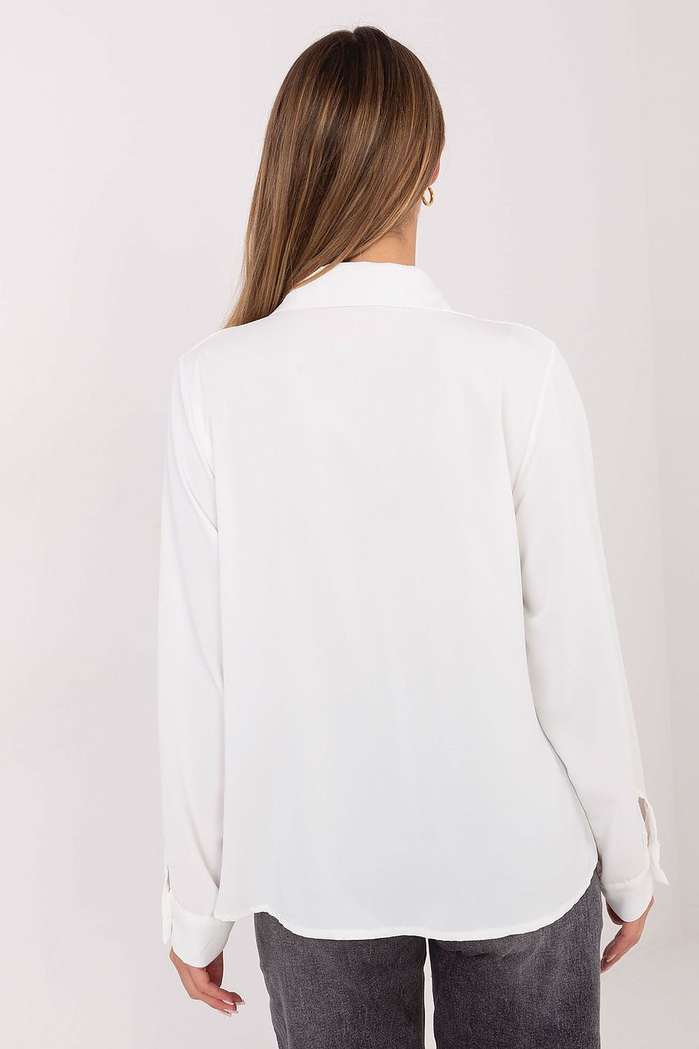 Complete outfit styling with the elegant polyester shirt by Factory Price, showcasing its versatility for both work and special occasions.