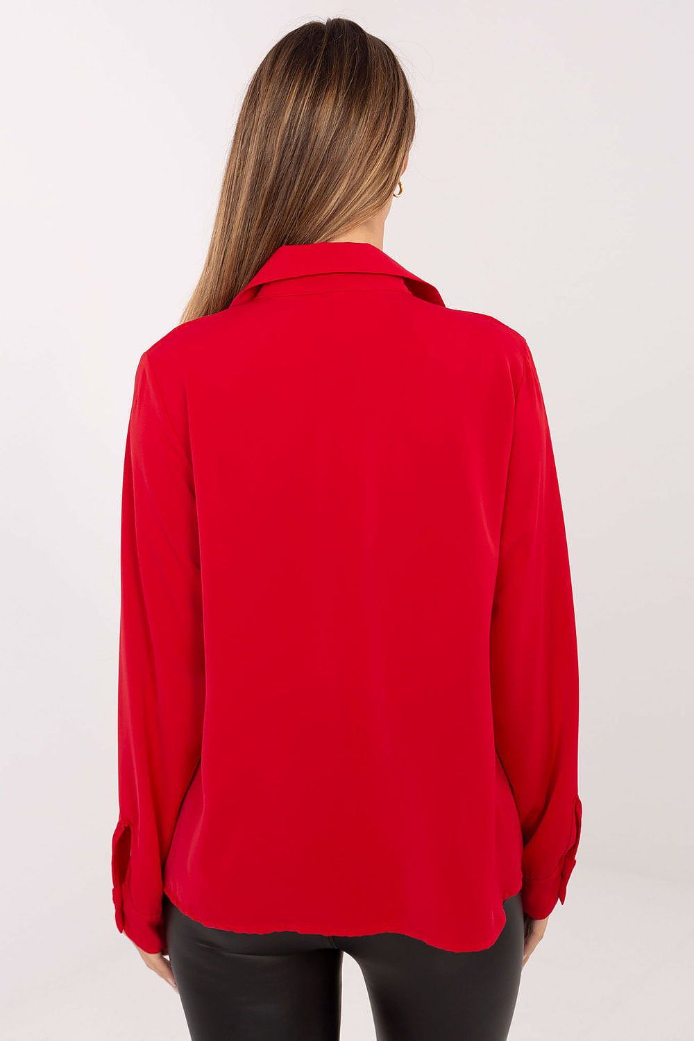 Detailed view of the decorative front tie and cuffed sleeves of the elegant women's polyester shirt from Factory Price.
