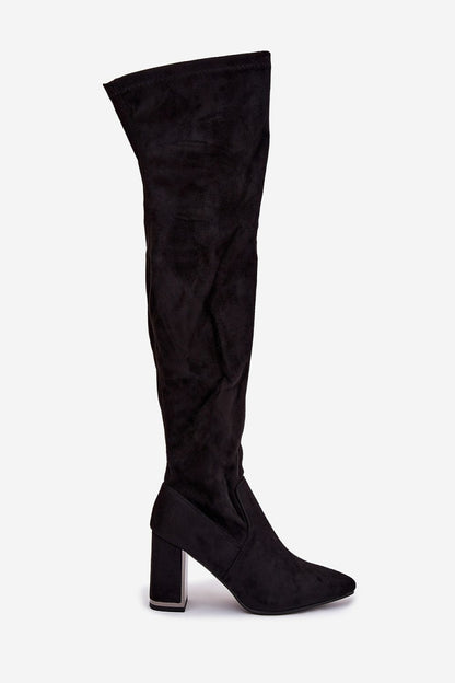 Stylish knee-high boots featuring a chic design and pointed toes, crafted by Step in Style for a feminine look.