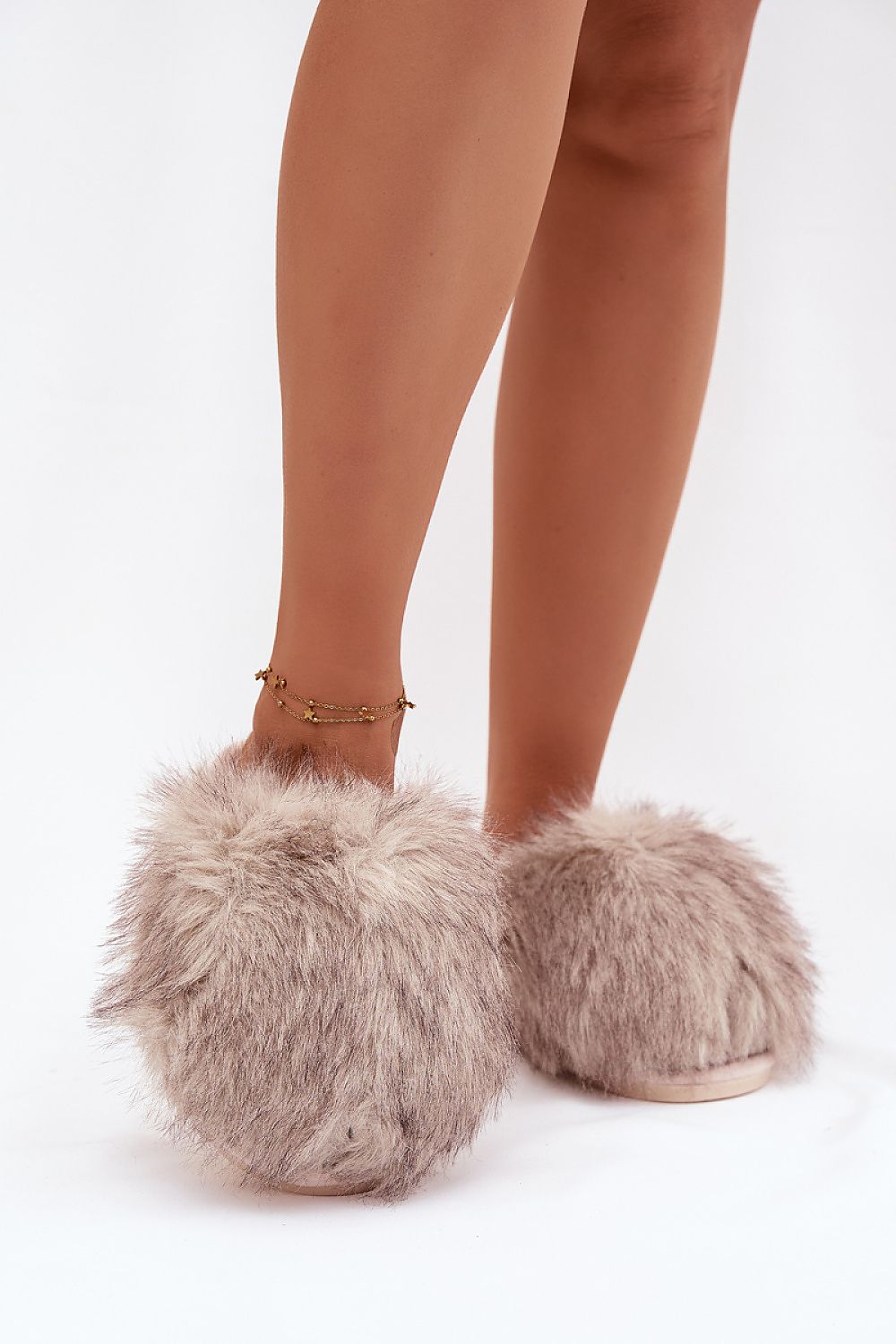 Luxurious women's fur slippers by Step in Style, designed for winter comfort and warmth, available in sizes EU 36 to EU 41, perfect for home styling.