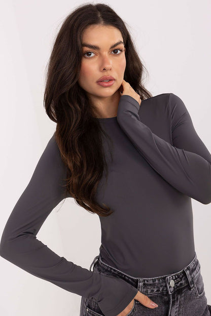 Back view of the luxury fitted long sleeve blouse by Sublevel, emphasizing its sleek silhouette and perfect fit.