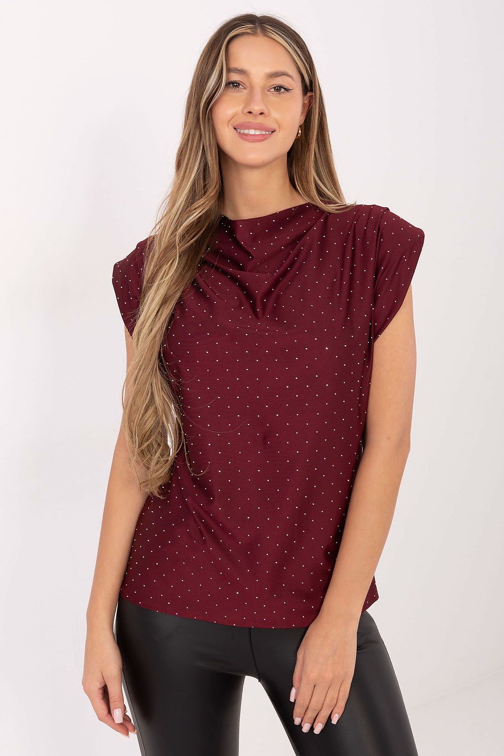 Elegant sleeveless blouse with jet application and shoulder pads by Italy Moda, showcasing a sophisticated design perfect for formal occasions. Made from a luxurious blend of polyester and elastane, this blouse enhances the silhouette with its flowing neckline and unique detailing.