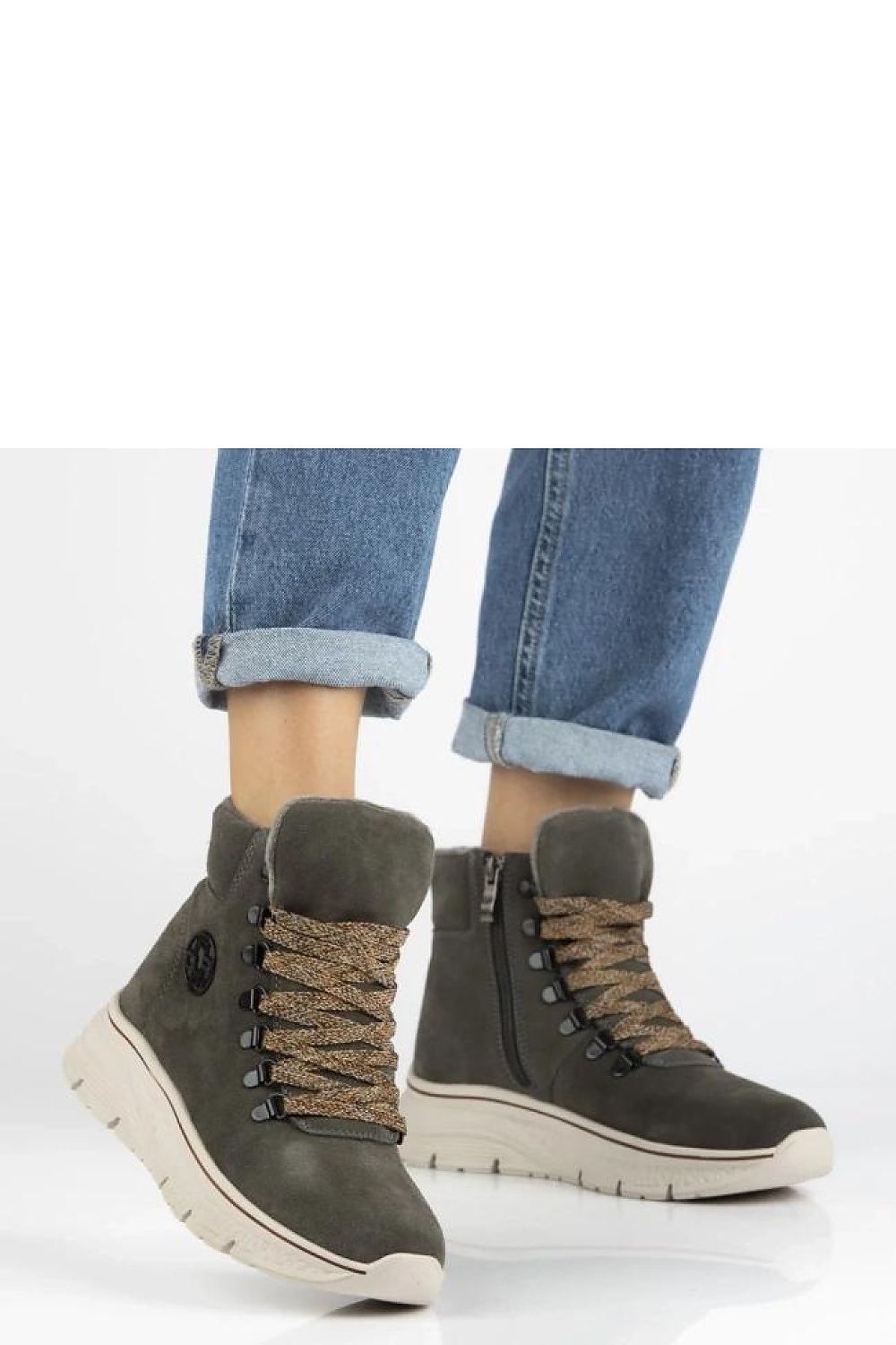 Elegant grey suede ankle boots by Solea, featuring decorative laces, perfect for stylish women's outfits.