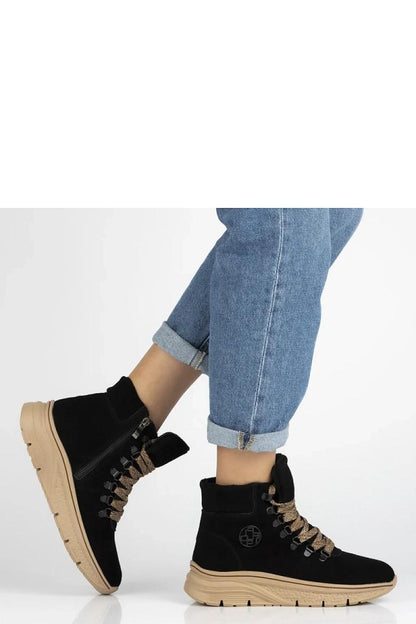 Solea grey suede ankle boots displayed on elegant background, highlighting their sophisticated design and comfortable fit.