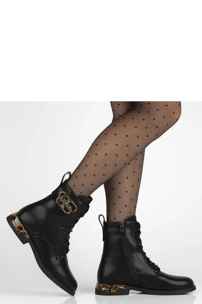 Versatile Filippo Ricka ankle boots in premium black leather with a striking panther motif, ideal for both formal and casual styles.