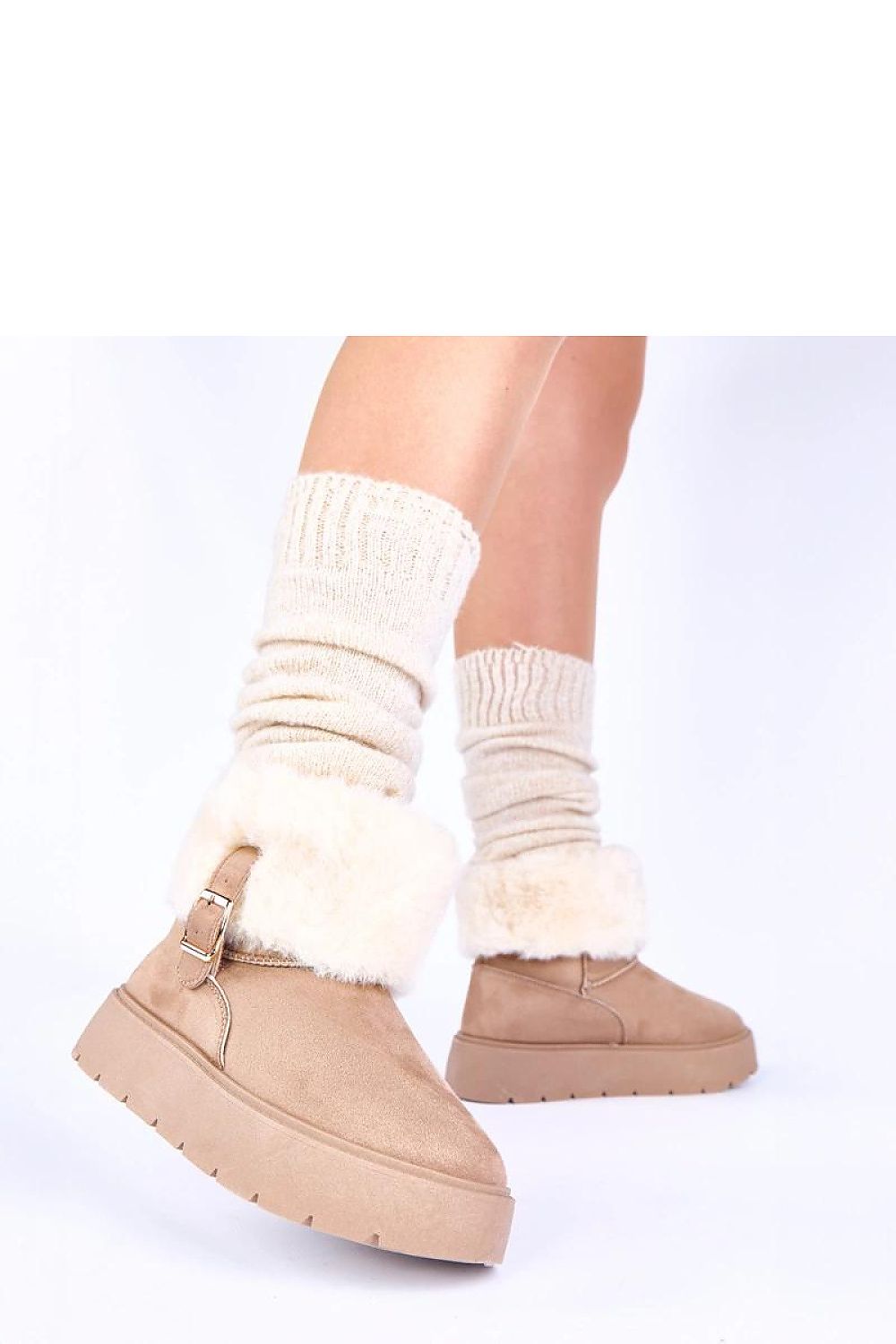 Stylish dark beige snow boots with Krissy fur by Solea, offering a blend of fashion and practicality, ideal for icy sidewalks and snowy streets.