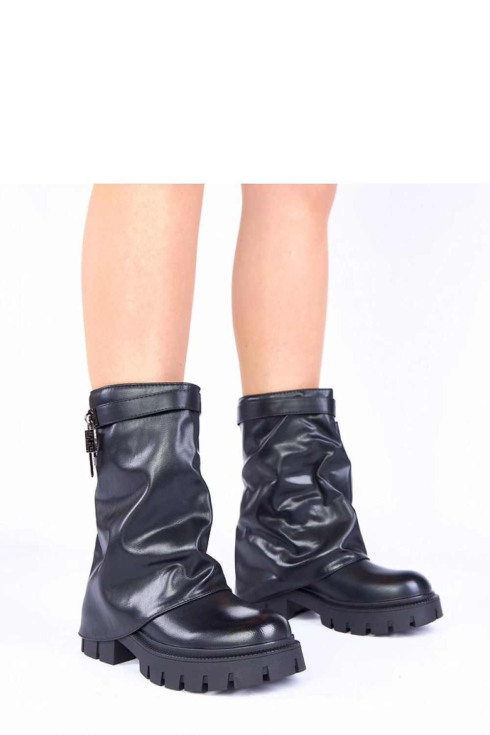 Close-up of Gemre Kisanet black platform ankle boots for women, featuring high-quality artificial leather for luxurious durability.