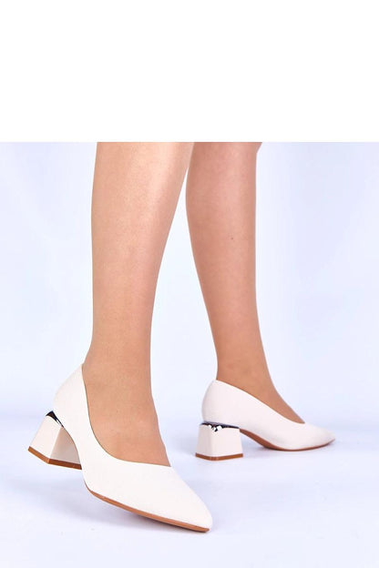 Black low-heeled pumps by Solea with silver accents, a timeless addition to any woman's wardrobe for glamorous occasions.