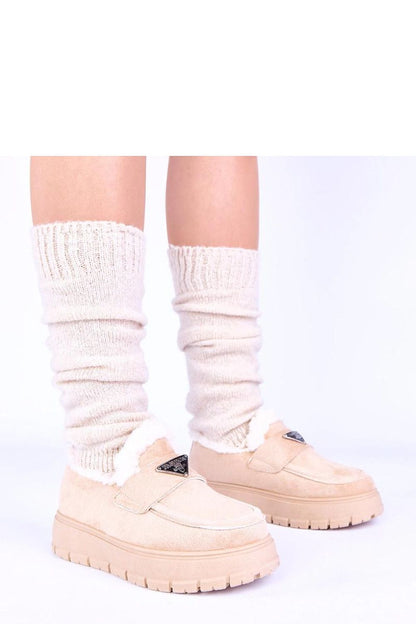 Elevated view of dark beige moccasins on Kirby platform by Solea, emphasizing the chic profile and stylish silhouette perfect for sophisticated looks.