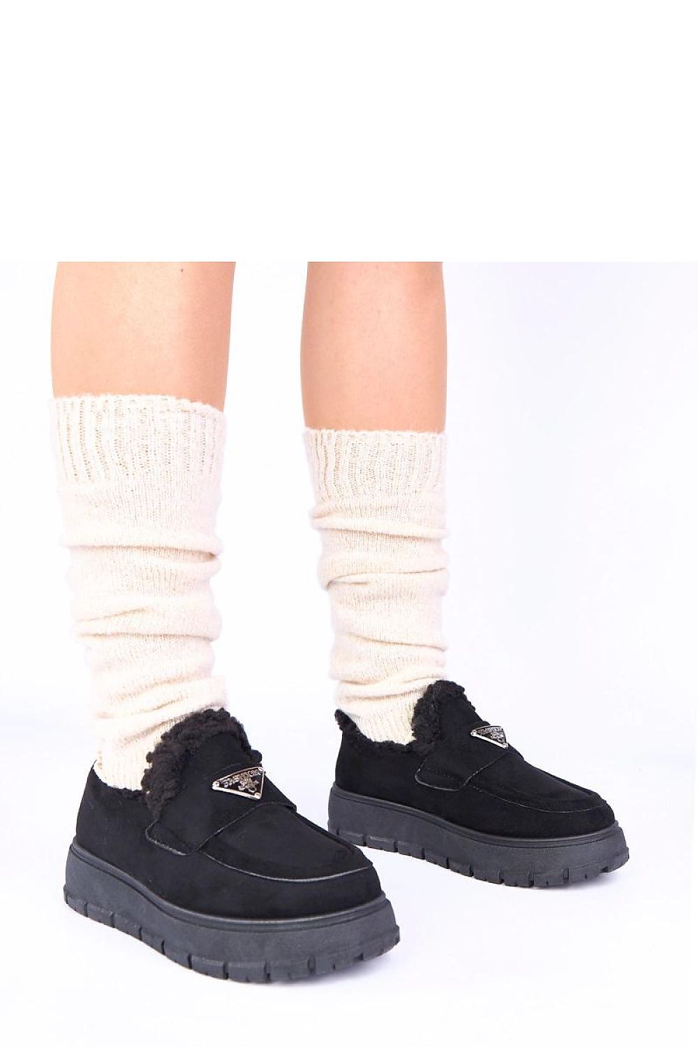 Close-up of luxurious dark beige fur-lined women's moccasins by Solea, highlighting the soft material and exquisite craftsmanship on the Kirby platform.