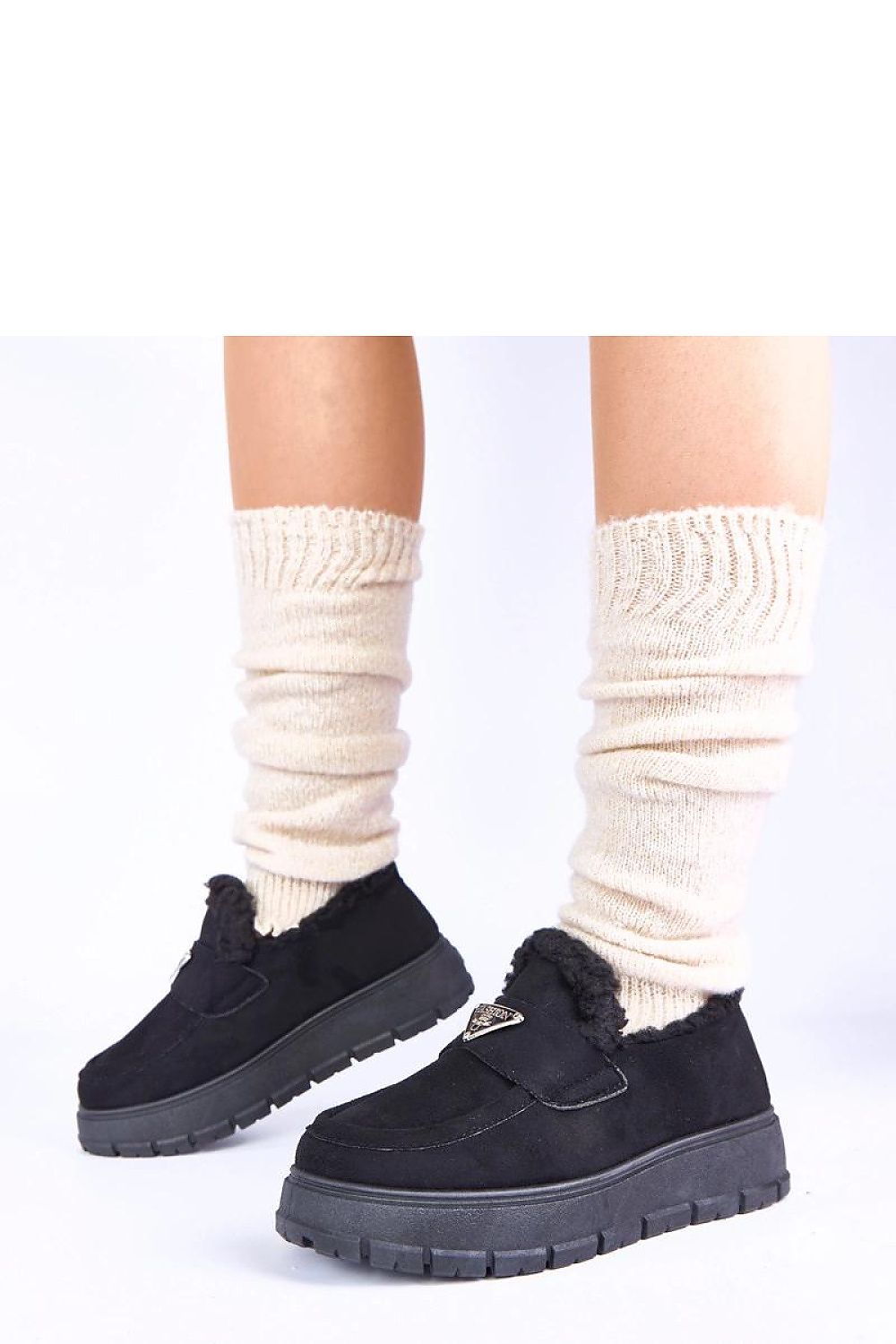 Solea women's moccasins in dark beige with fur lining, displayed on a platform, perfect for elevating your autumn and winter outfits.