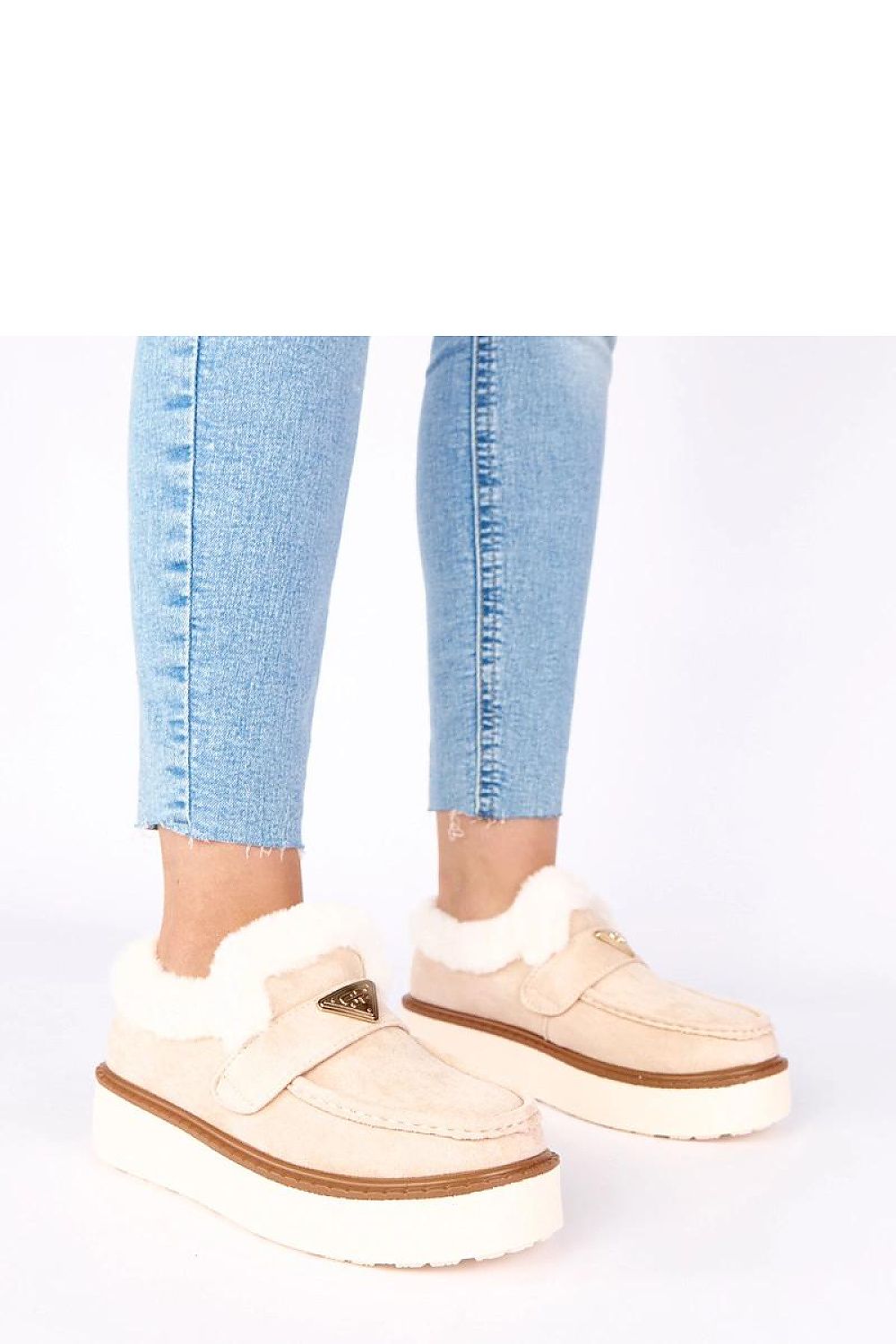 Elegantly designed light beige fur-lined moccasins for women by Solea, showcasing a perfect blend of comfort and style for autumn and winter wear.