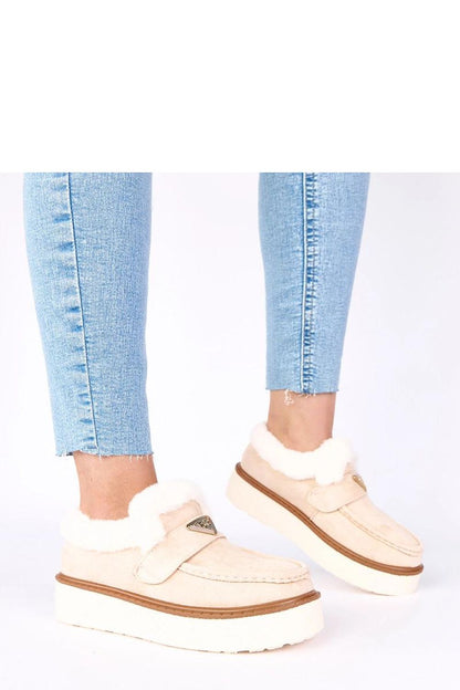 Sophisticated Solea light beige moccasins featuring soft fur lining, ideal for women seeking fashionable footwear that prioritises warmth and comfort.