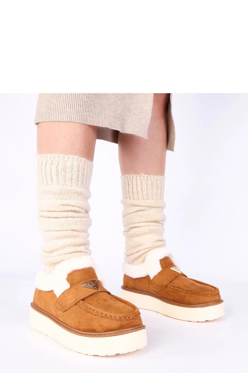 Fur-lined loafers from Solea, showcasing a timeless light beige colour, perfect for casual or semi-formal wear.