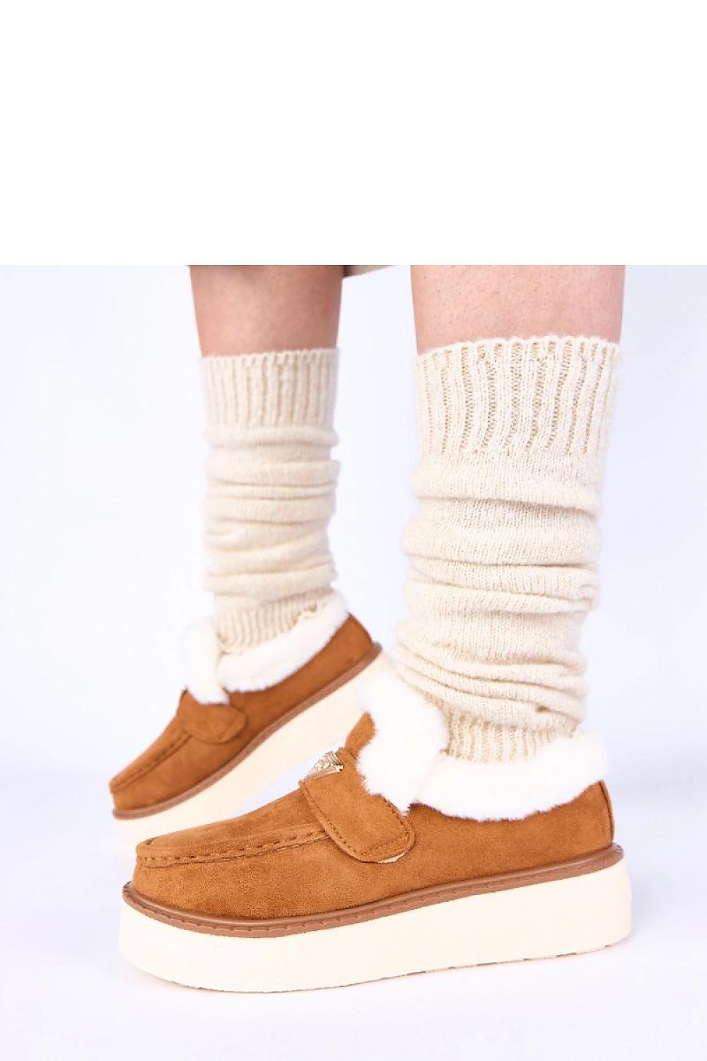 Chic Loafy model women's moccasins in light beige, crafted by Solea, embodying sophistication and warmth with soft fur lining, ideal for versatile fashion.