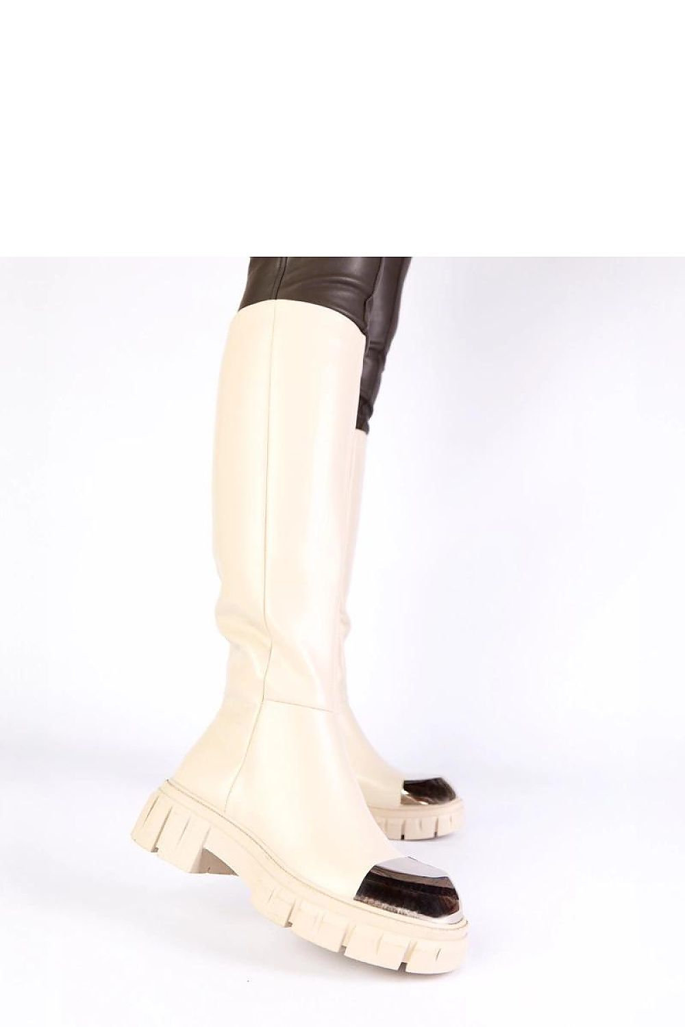 Elegant beige thigh-high boots by Solea featuring a luxurious gold toe cap, perfect for stylish autumn and winter outfits.