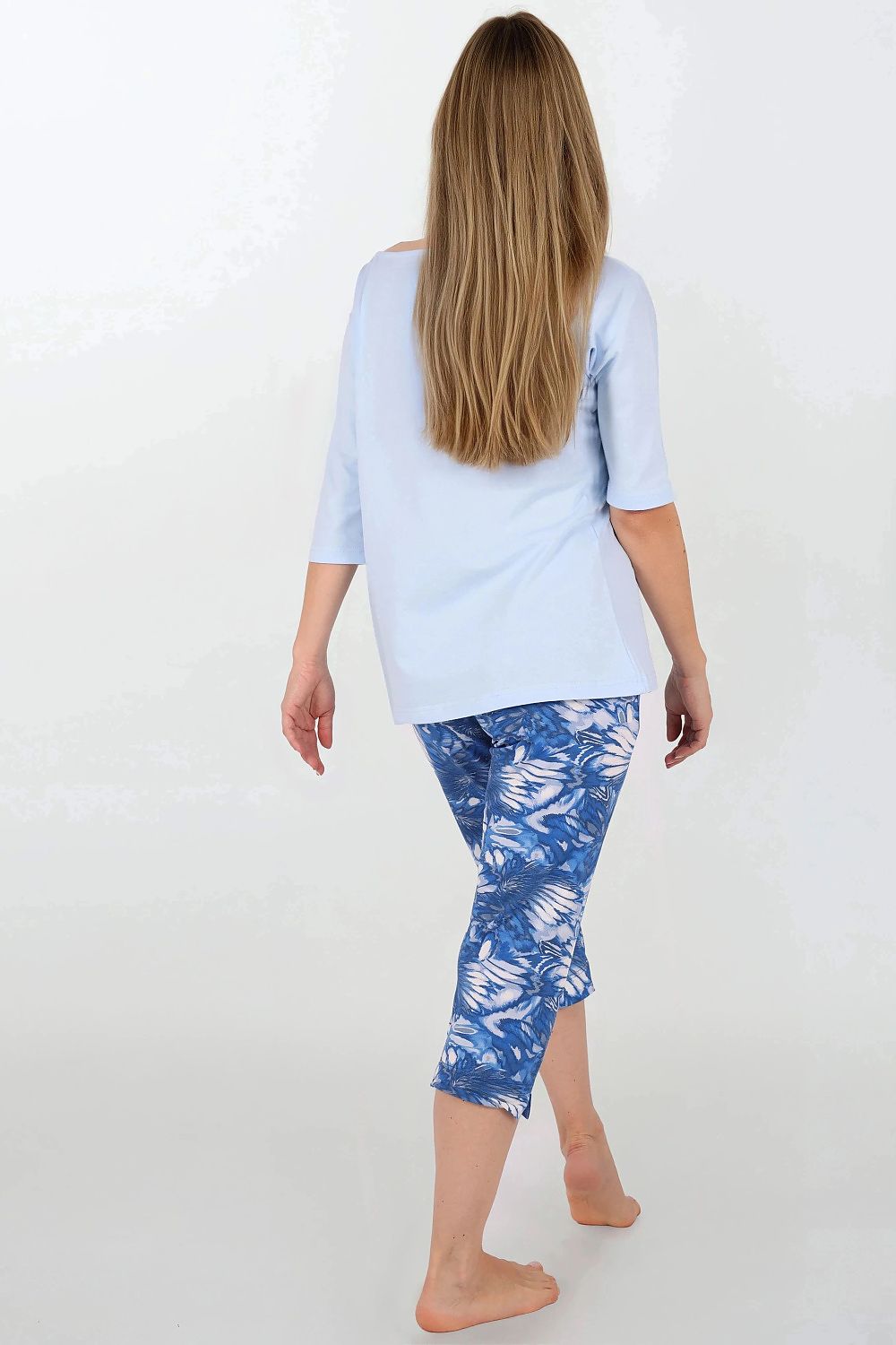 Elegant 7/8 length pants of the Luxury Women's Pajama Set by Momenti Per Me, designed with a subtle pattern and comfortable elastic waistband.