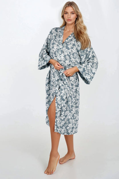 Luxury women's viscose bathrobe from Momenti Per Me, showcasing elegant design with a loose fit, wide sleeves, and delicate fabric perfect for comfort and style.