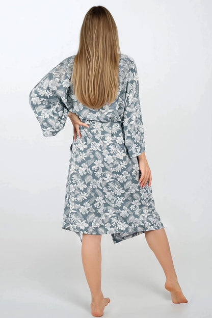 Elegant women's luxury viscose bathrobe by Momenti Per Me, showcasing a stylish loose fit, wide sleeves, and practical pockets in a sophisticated subdued colour.