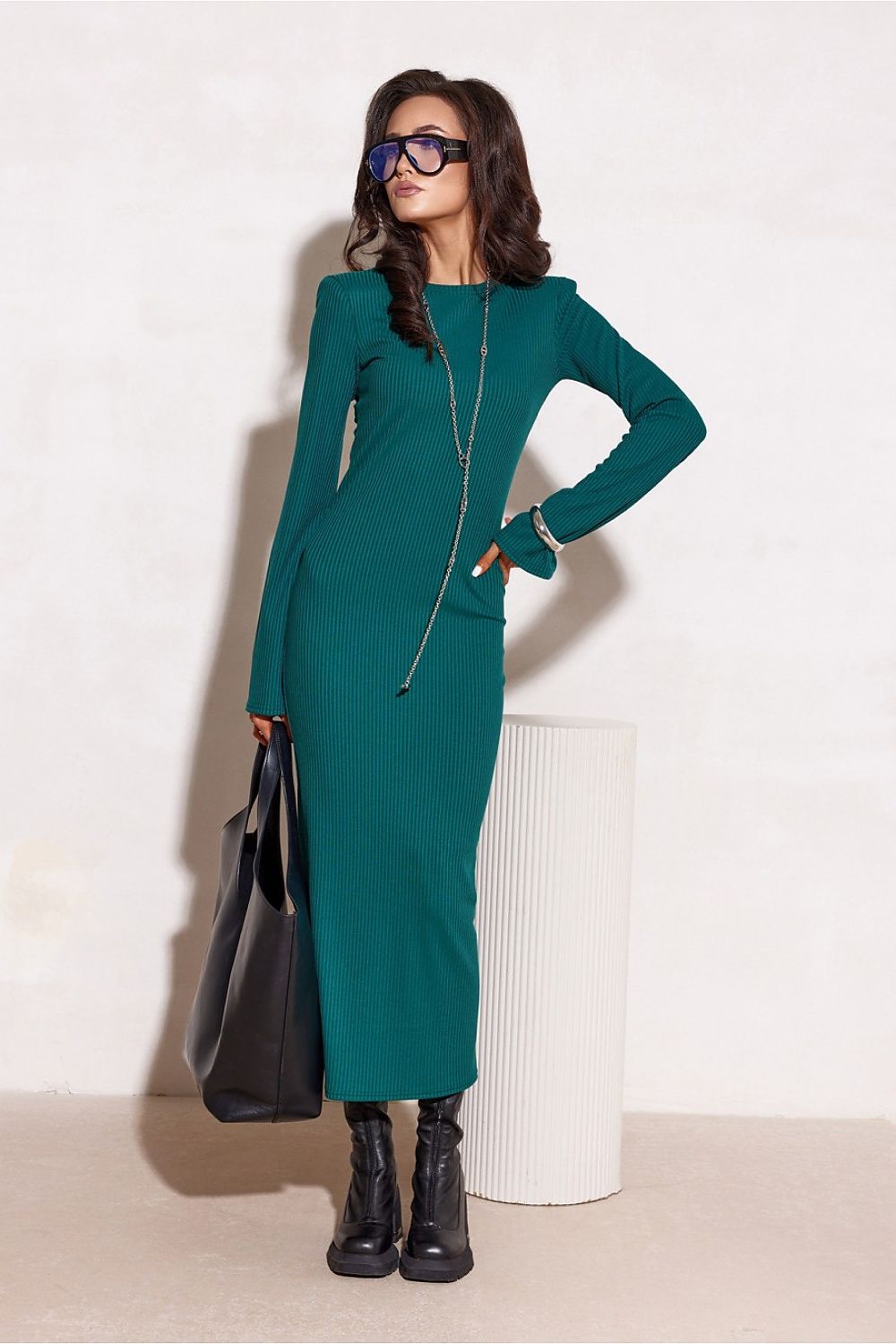 Elegant Knit Daydress by Roco Fashion, showcasing a soft and breathable fabric that perfectly fits the silhouette, ideal for sophisticated everyday wear in EU sizes 36-40.