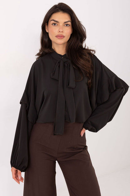 Elegant women’s collarless shirt by Factory Price, featuring lightweight ruffle design, long sleeves, and a decorative neckline, ideal for sophisticated outfits.