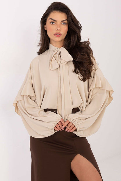 Factory Price's stylish women's collarless shirt in polyester, showcasing long puffy sleeves and a chic ruffle detail for a sophisticated look.