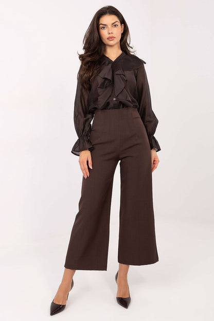 Close-up view of the women's long sleeve shirt's soft fabric texture, featuring a romantic frill detail, by Factory Price.