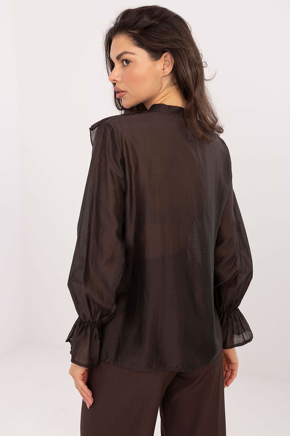 Stylish women's collarless shirt showcasing its elegant silhouette and sophisticated ruffled design, by Factory Price.