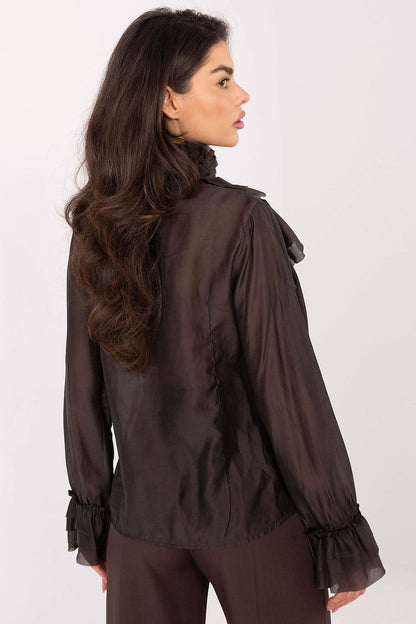 Close-up of the exquisite details on the elegant women's shirt by Factory Price, showcasing the jabot with tie and flounce sleeves, highlighting the sophisticated craftsmanship.