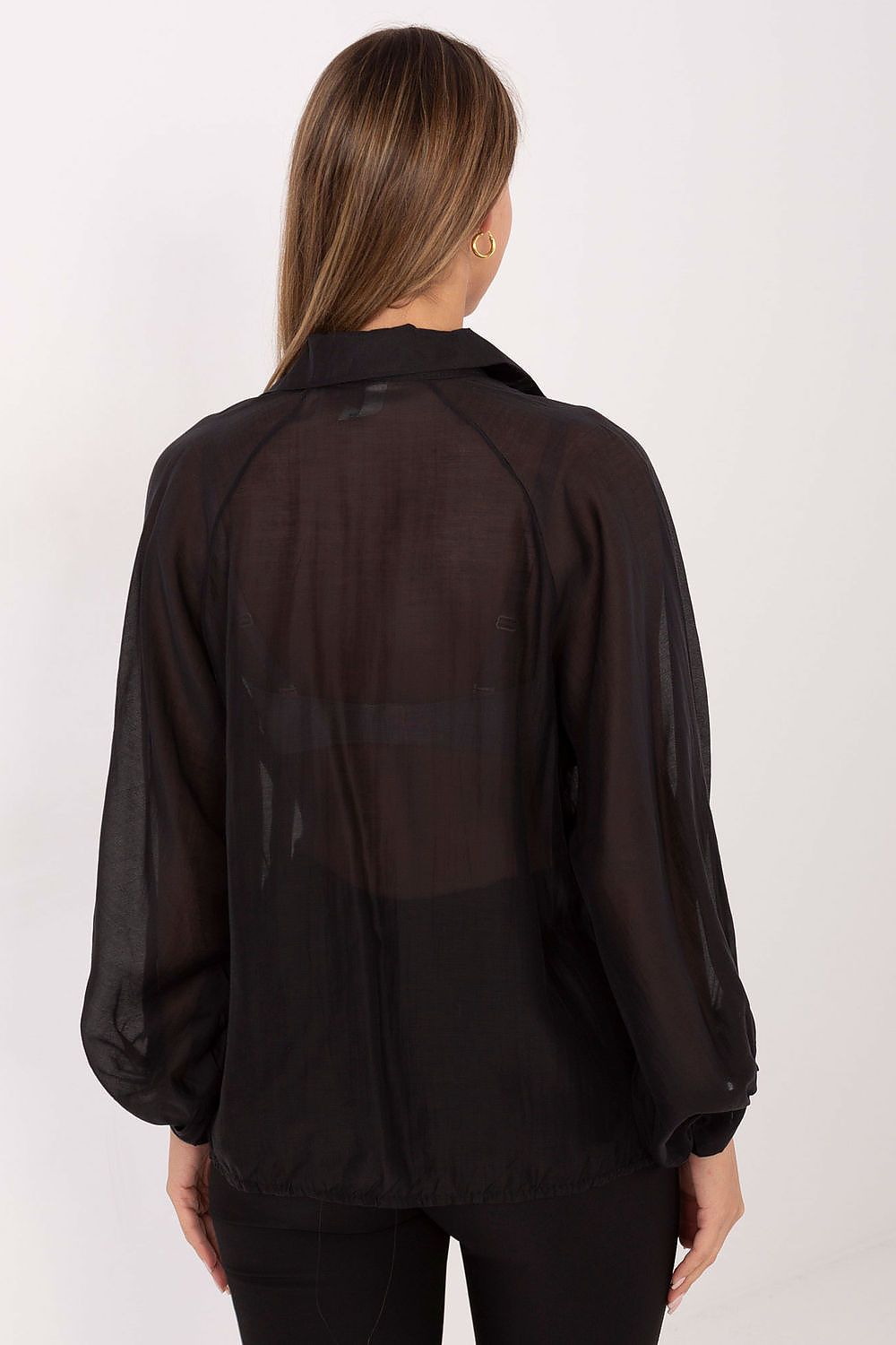 Model wearing the elegant long sleeve shirt by Factory Price, showcasing its flowy silhouette and sophisticated design for both casual and formal occasions.