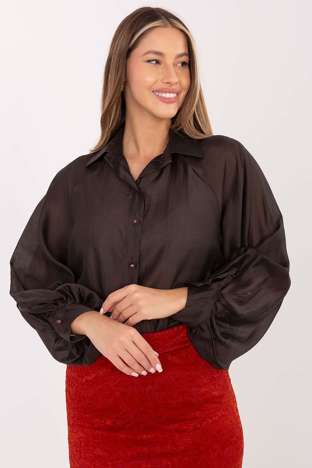 Detail view of decorative buttons on the long sleeve women's shirt by Factory Price, highlighting the impeccable craftsmanship and luxurious elements.