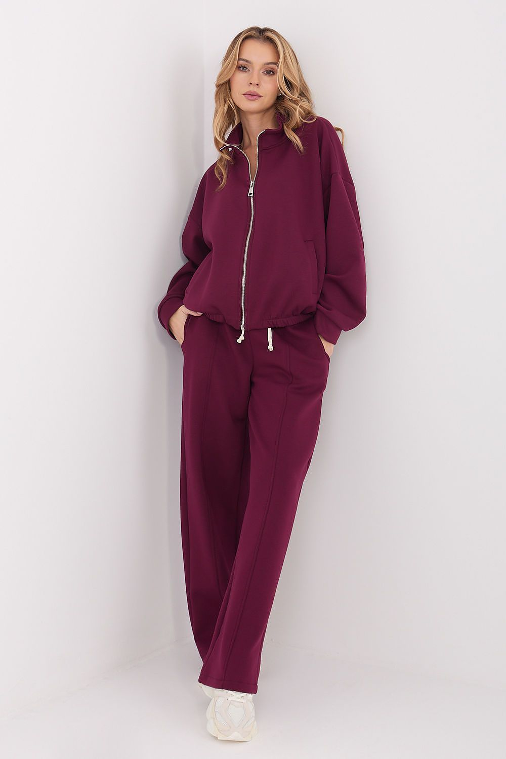 Sophisticated high-waisted sweatpants by Factory Price, crafted from a soft fabric blend, offering style and functionality with convenient side pockets.