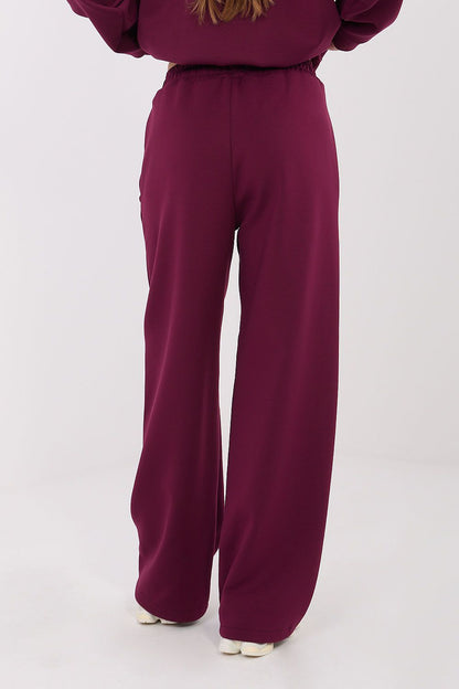 Stylish high-waisted wide leg sweatpants from Factory Price, perfect for casual outings, elegantly emphasising comfort and silhouette.
