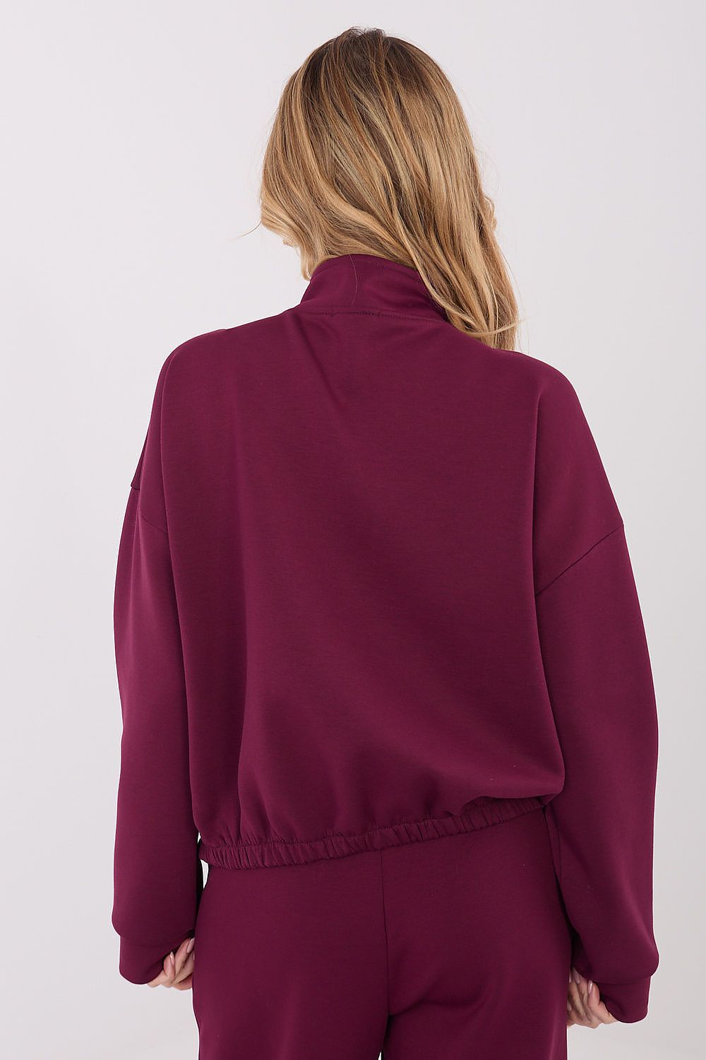 Luxurious women's zippered sweatshirt by Factory Price displayed on a mannequin, highlighting its elegant design and perfect fit.