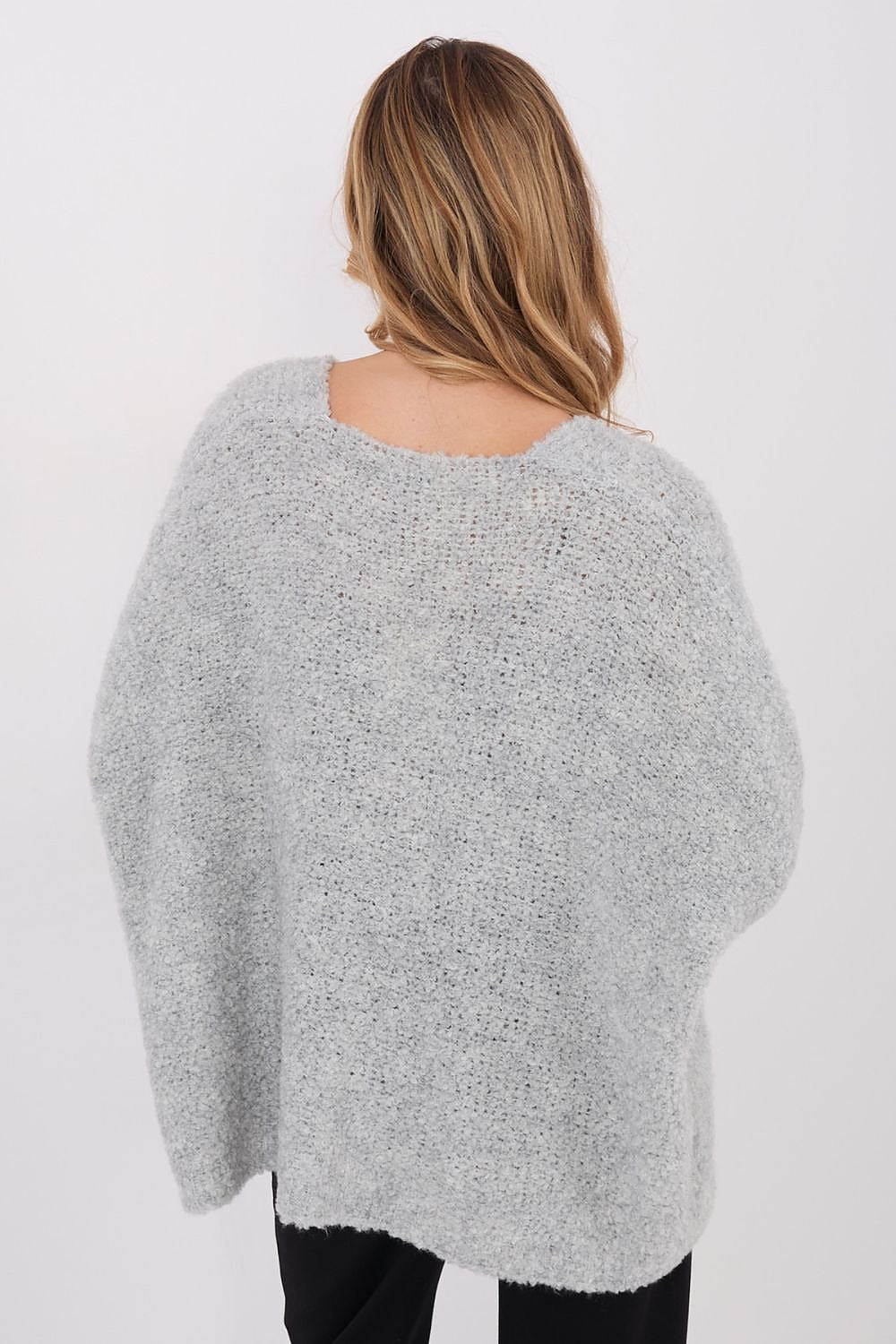 Luxurious women's cardigan sweater featuring long sleeves and a classic V-neckline, made with an acrylic blend for ultimate comfort, by Factory Price.
