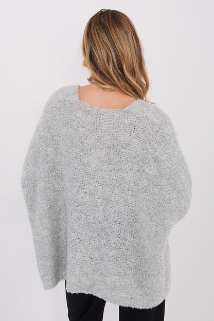 Luxurious women's cardigan sweater featuring long sleeves and a classic V-neckline, made with an acrylic blend for ultimate comfort, by Factory Price.