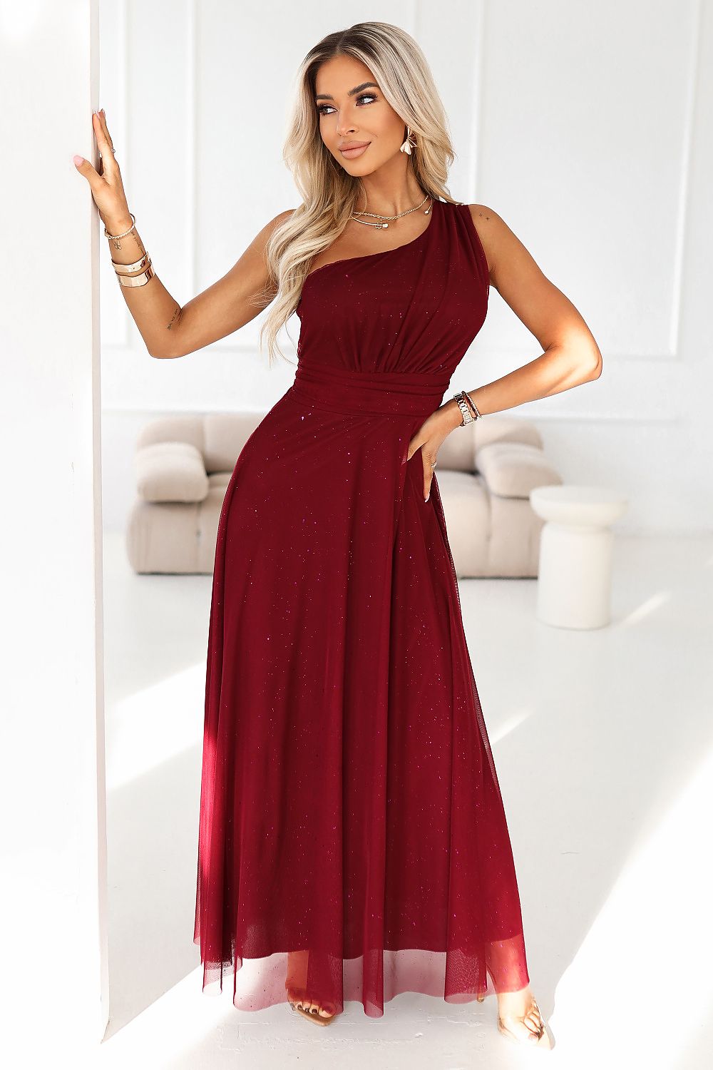 Elegant one-shoulder burgundy maxi dress by Numoco, crafted from lightweight brocade fabric, perfect for weddings and formal events.